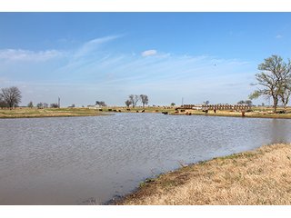 Tract 16 - LAND & MINERAL ACRES OKLAHOMA AUCTION, 588+/- Land & Producing Mineral Acres offered in 24 Tracts in Okmulgee County